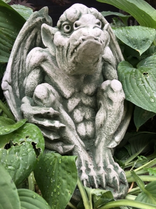 Gargoyle figure medieval dragon demon protector church figures.